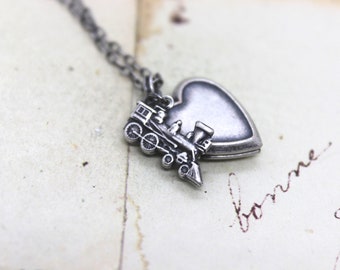 train. heart locket necklace. silver ox