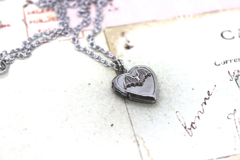 bat. locket necklace. in antiqued shiny silver tone inset heart image 1