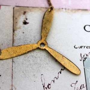 propeller. necklace. gold ox jewelry image 3