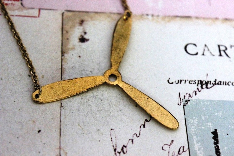 propeller. necklace. gold ox jewelry image 3