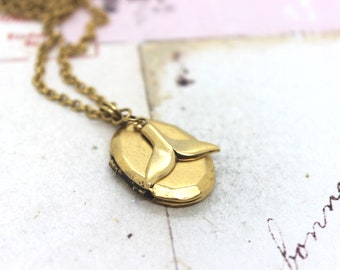 whale tail. locket necklace. in gold ox