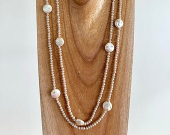 Long beige crystal necklace with pearl accents