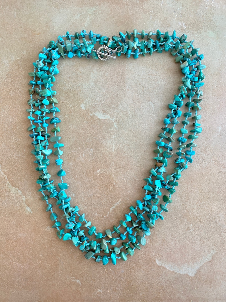 Very long southwestern style hand tied turquoise chip necklace
