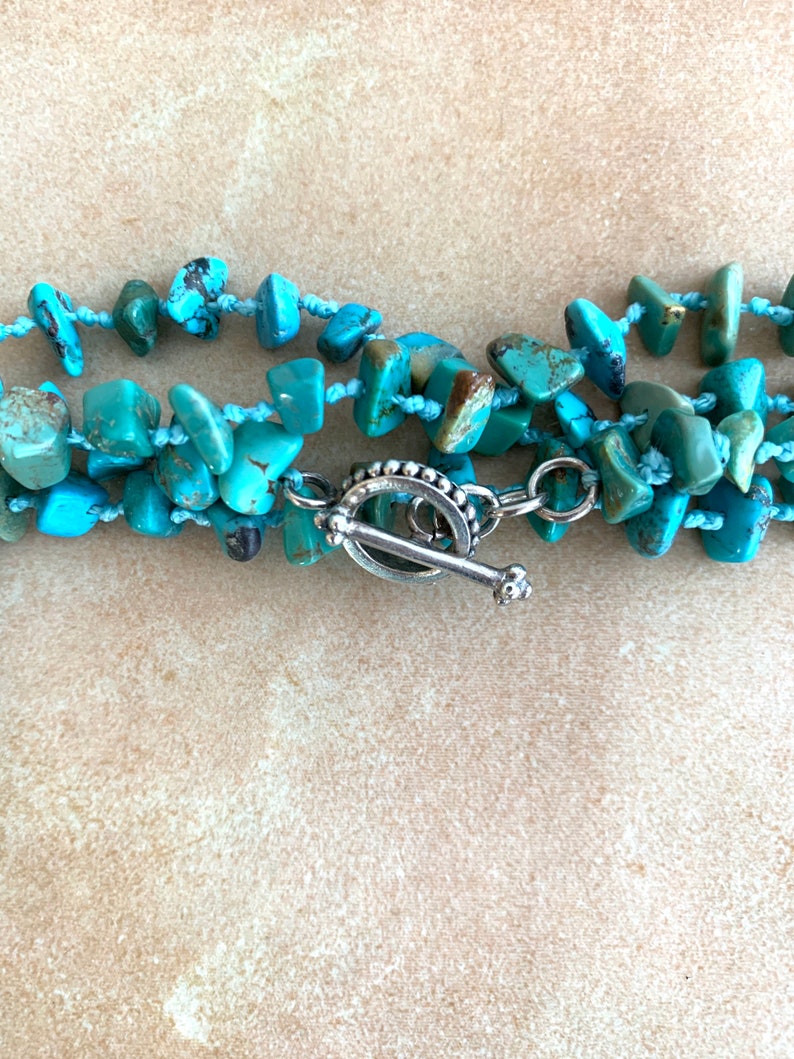 Very long southwestern style hand tied turquoise chip necklace