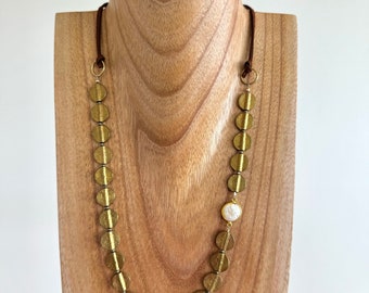 Playful bronze coin and pearl necklace