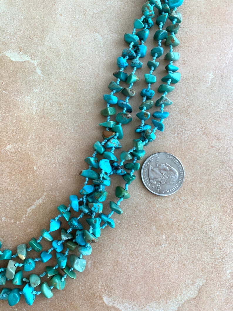 Very long southwestern style hand tied turquoise chip necklace