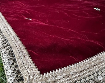 Luxurious handmade velvet shawl with intricate embroidery and lace detailing.