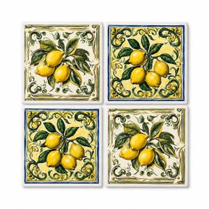 May include: A set of four square ceramic tiles featuring hand-painted illustrations of yellow lemons with green leaves. Each tile displays a different arrangement of fruit surrounded by intricate scrollwork patterns in shades of yellow, blue, and green.