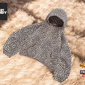 Moletom oversized com estampa de leopardo | Pulôver unissex de tecido pesado