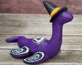 Handmade cute purple skull Halloween witch's hat Loch Ness Monster Nessie miniature polymer clay kawaii sculpture