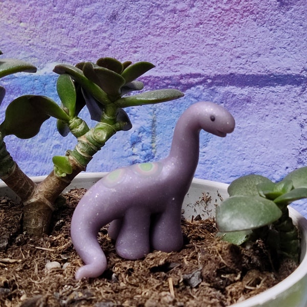 Pale pastel purple brontosaurus brachiosaurus dinosaur miniature cute kawaii glow in the dark figurine
