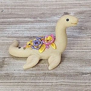 Ivory colored miniature pastel floral Nessie lake monster dinosaur figurine image 1