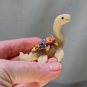 Ivory colored miniature pastel floral Nessie lake monster dinosaur figurine image 2