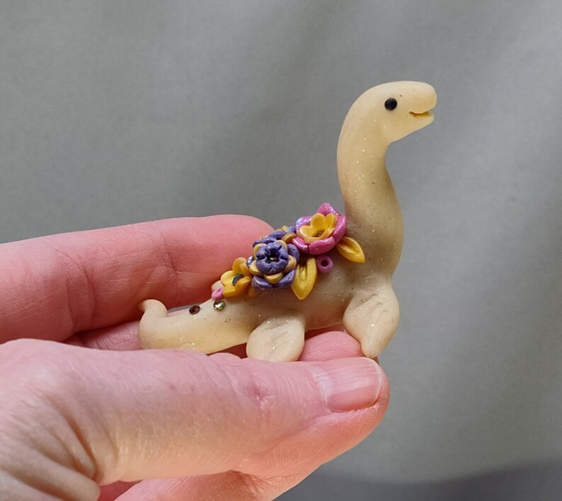 Ivory colored miniature pastel floral Nessie lake monster dinosaur figurine image 2