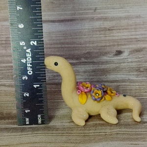 Ivory colored miniature pastel floral Nessie lake monster dinosaur figurine image 3