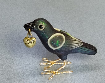 Handmade Iridescent Black Raven Crow with heart miniature polymer clay bird sculpture OOAK