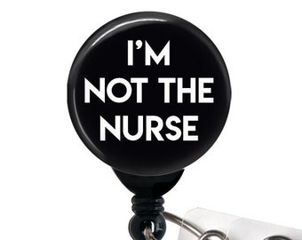 I'm Not the Nurse Badge Reel, Badge Holder with Swivel Clip, Belt Clip, Carabiner, Swappable Topper, Funny Badge, 34" Cord, 1.5" BUTTON