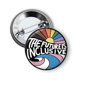 May include: A round button with a black background and a rainbow wave design. The text "THE FUTURE IS INCLUSIVE" is written in white on the wave. The rainbow wave is made up of the colors red, orange, yellow, green, blue, indigo, and violet. The wave is also made up of the colors brown, pink, and light blue.