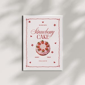 Könnte beinhalten: Rechteckiger Druck mit einem Erdbeerkuchen-Design. Die Worte "Strawberry Cake" sind in eleganter Schrift gehalten, mit den Sätzen "Sweet" und "Treat" unter dem Kuchenbild. Der Druck wird von einem roten Zierrahmen umrandet.
