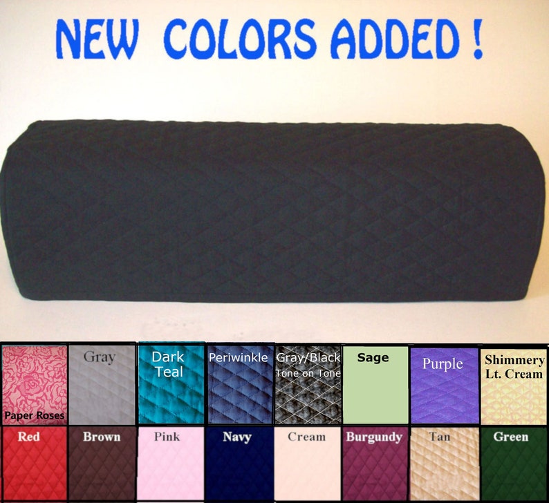 May include: A black quilted fabric item with rounded ends, possibly a furniture cover. The image includes a color chart with options like gray, teal, periwinkle, sage, and burgundy. Text reads "NEW COLORS ADDED!"