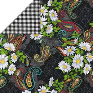 May include: Reversible fabric with a black and white gingham pattern on one side and a floral paisley design on the other. The paisley pattern features white daisies, green leaves, and colorful paisley shapes on a black diamond-patterned background.