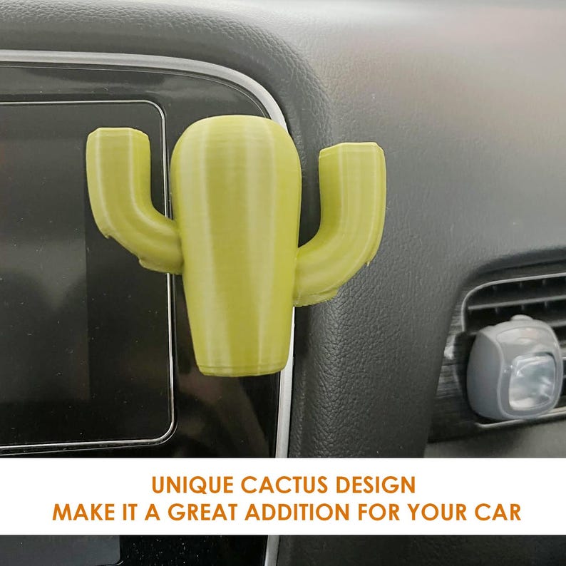 May include: A green cactus-shaped car air freshener. The air freshener is attached to the dashboard of a car. The text "UNIQUE CACTUS DESIGN MAKE IT A GREAT ADDITION FOR YOUR CAR" is at the bottom of the image.