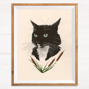 May include: A framed illustration of a black and white cat with green eyes. The cat is looking directly at the viewer. The background is a light beige color. There are three brown cattails with green leaves in the bottom center of the image. The artist's signature is in the bottom right corner.