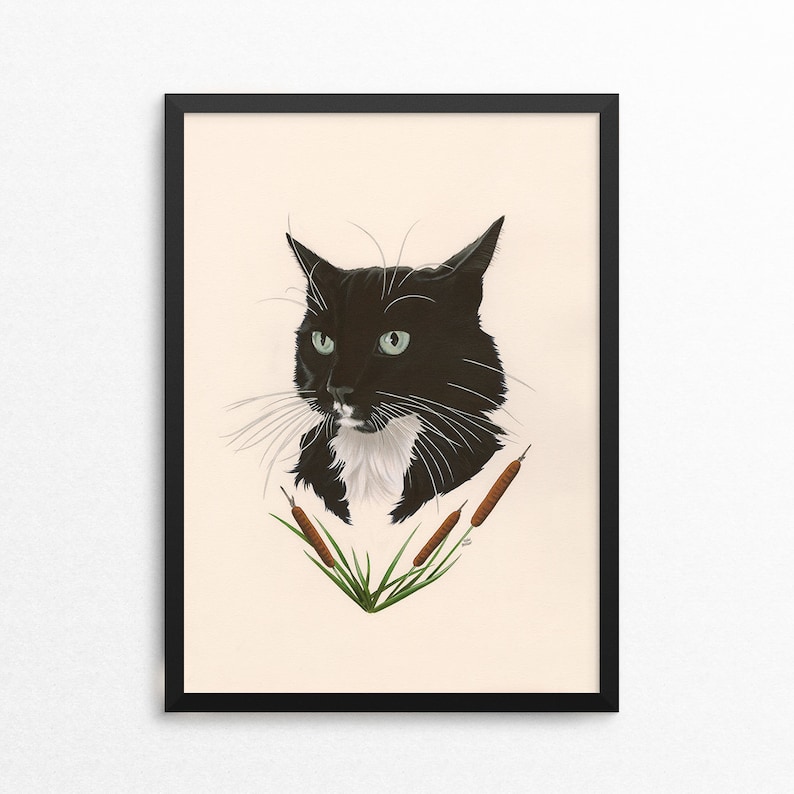 May include: A black and white cat with green eyes looking to the left. The cat has a white patch on its chest and is surrounded by brown cattails and green grass.