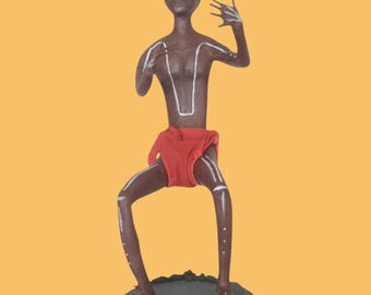 Young Australian aboriginal dancing paper mache unique sculpture
