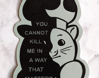 May include: Black and white sticker with a cartoon cat wearing a mushroom hat. The text on the sticker reads "You cannot kill me in a way that matters."