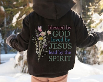 May include: Black hooded sweatshirt with a floral design and the text "blessed by GOD loved by JESUS lead by the SPIRIT" printed on the back.