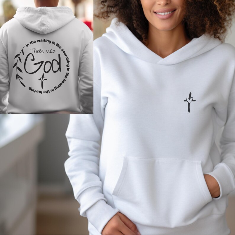 May include: White hoodie with a black cross and heart design on the front and a black graphic with the text "There was God in the hurting in the waiting in the searching in the healing" on the back.