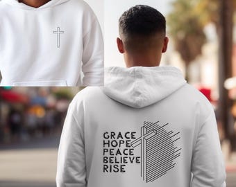 May include: White hooded sweatshirt with a small cross on the front and a larger cross with the words "GRACE HOPE PEACE BELIEVE RISE" on the back.
