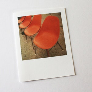 vintage orange chairs instant film card image 1