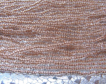 Seed Bead 11/0 Copper Lined Clear about 1500 Beads