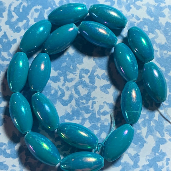 Oval Glass Beads about  15 x 8mm  17  Beads Iridescent Blue Color