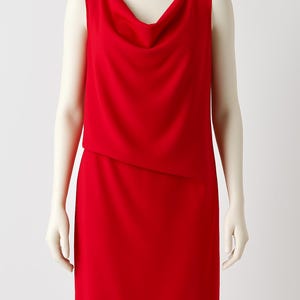 May include: A sleeveless red dress with a cowl neck and a fitted silhouette.