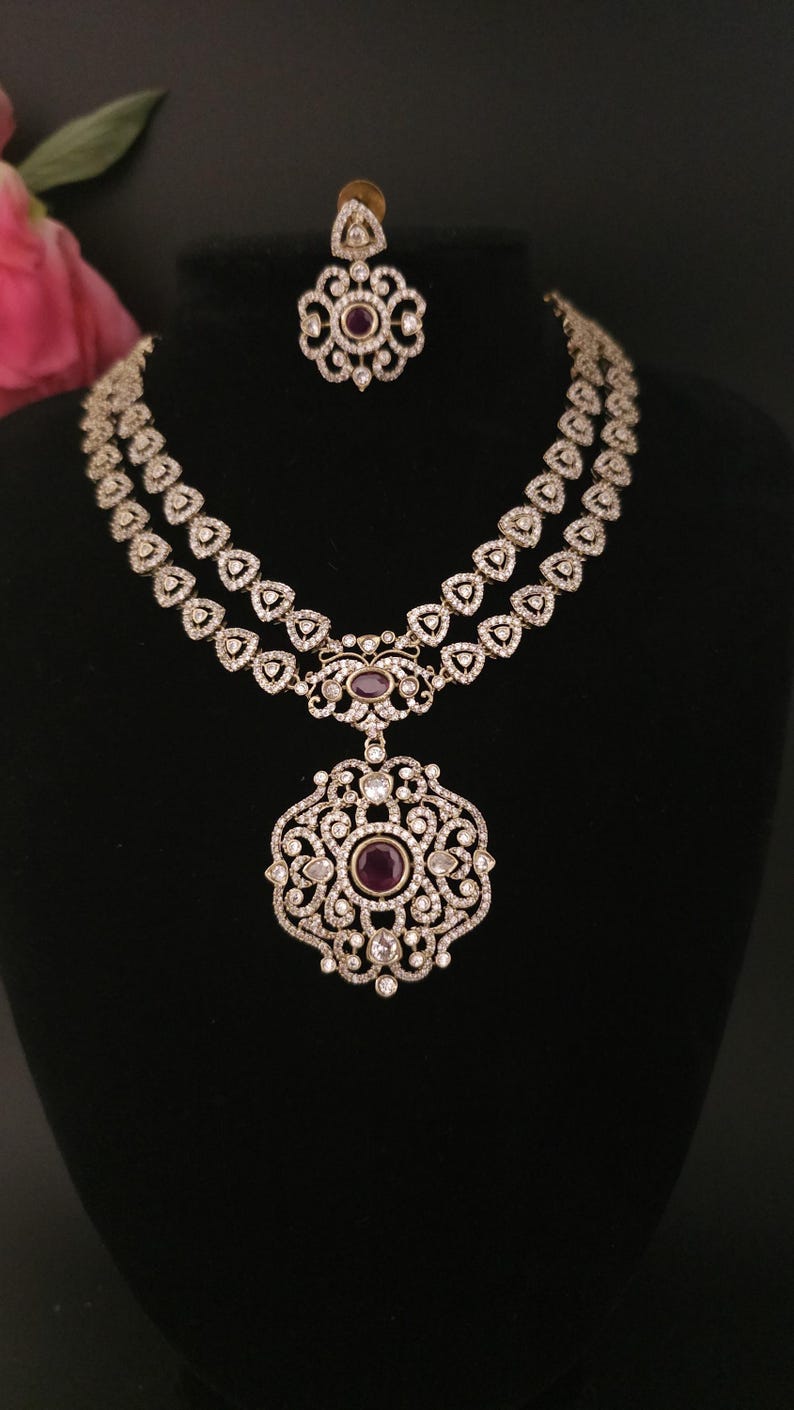 Moissanite stone necklace set with Red centre stone.
