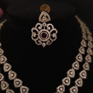 Moissanite stone necklace set with Red centre stone.