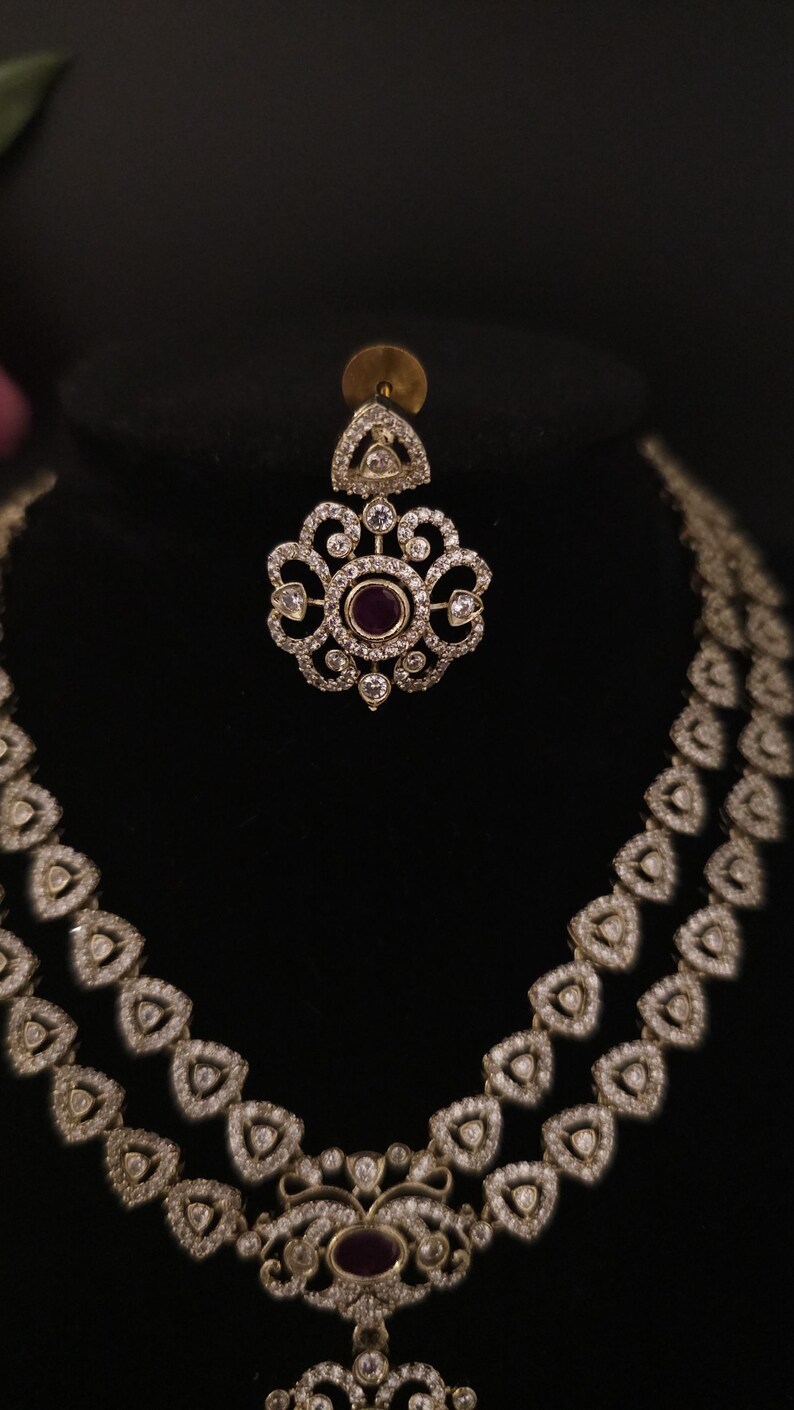 Moissanite stone necklace set with Red centre stone.