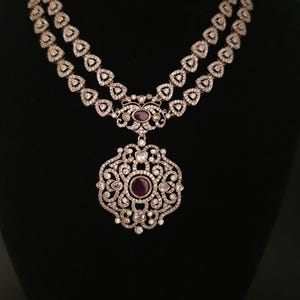 Moissanite stone necklace set with Red centre stone.