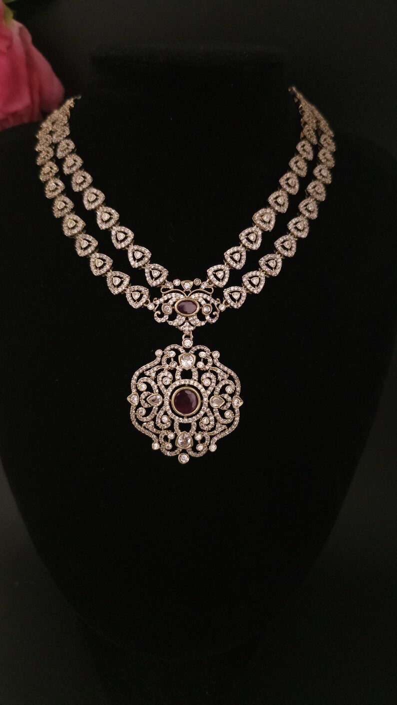 Moissanite stone necklace set with Red centre stone.