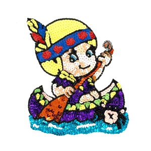 May include: A sequined patch depicting a cartoon figure in a canoe. The figure wears a yellow headdress with red and blue accents and holds a paddle. The canoe is purple, green, and blue, with a turquoise water base.