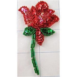 May include: A red and green sequined flower applique. The flower has a red center and green leaves. The stem is made of green beads.