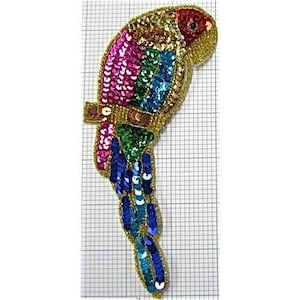 May include: A colorful sequined parrot applique with a gold trim. The parrot is pink, green, blue, and gold. The tail is long and flowing.