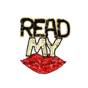 May include: A sequinned patch featuring the words "READ MY" in black and gold sequins, above a pair of red sequinned lips. The patch is set against a white background.