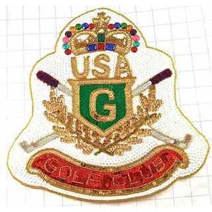 May include: A white embroidered patch with a gold crown, crossed golf clubs, and a green shield with a gold "G" inside. The shield is surrounded by gold laurel leaves. The text "USA GOLF CLUB" is on a red banner below the shield.