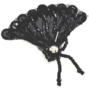 May include: Black beaded fan with a black mesh fabric and a single white bead in the centre. The fan has two black beaded strings attached to the bottom.
