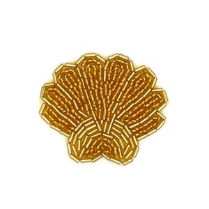 May include: A shell-shaped patch crafted from metallic gold bugle beads and seed beads. The design features a scalloped edge and a radiating pattern of vertical and curved lines, creating a textured, shimmering surface in a bright gold tone.