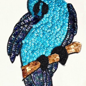 Parrot with Turquoise, Bronze and Moonlight Sequins, Black Beads and a Rhinestone Eye 10.5" x 6.75"